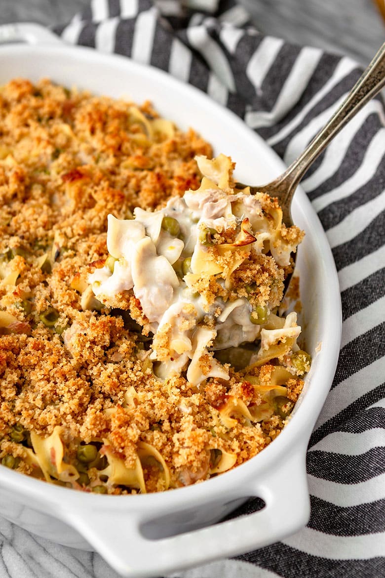 These family-friendly meals use pantry ingredients like beans, lentils, canned goods, pasta, rice, and broth, plus or minus staples that keep well in the freezer or refrigerator. These flexible recipes are all about using what you have on hand to make easy, delicious lunches and dinners! | glitterinc.com | @glitterinc // 6-Ingredient Easy Tuna Casserole with Egg Noodles