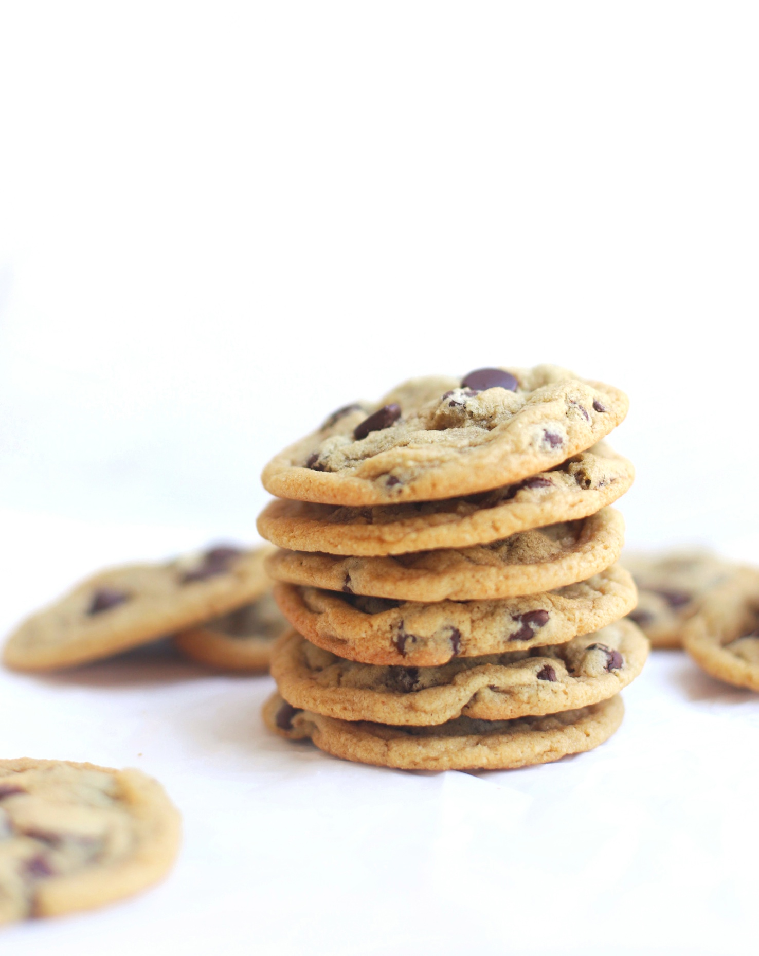 These are the very best dairy free chocolate chip cookies ever. Made in one bowl, the easy recipe results in ooey gooey, oh-so-soft and chewy perfect chocolate chip cookies every time. Plus, we have a few tricks for making these cookies vegan, and/or gluten-free too! | glitterinc.com | @glitterinc
