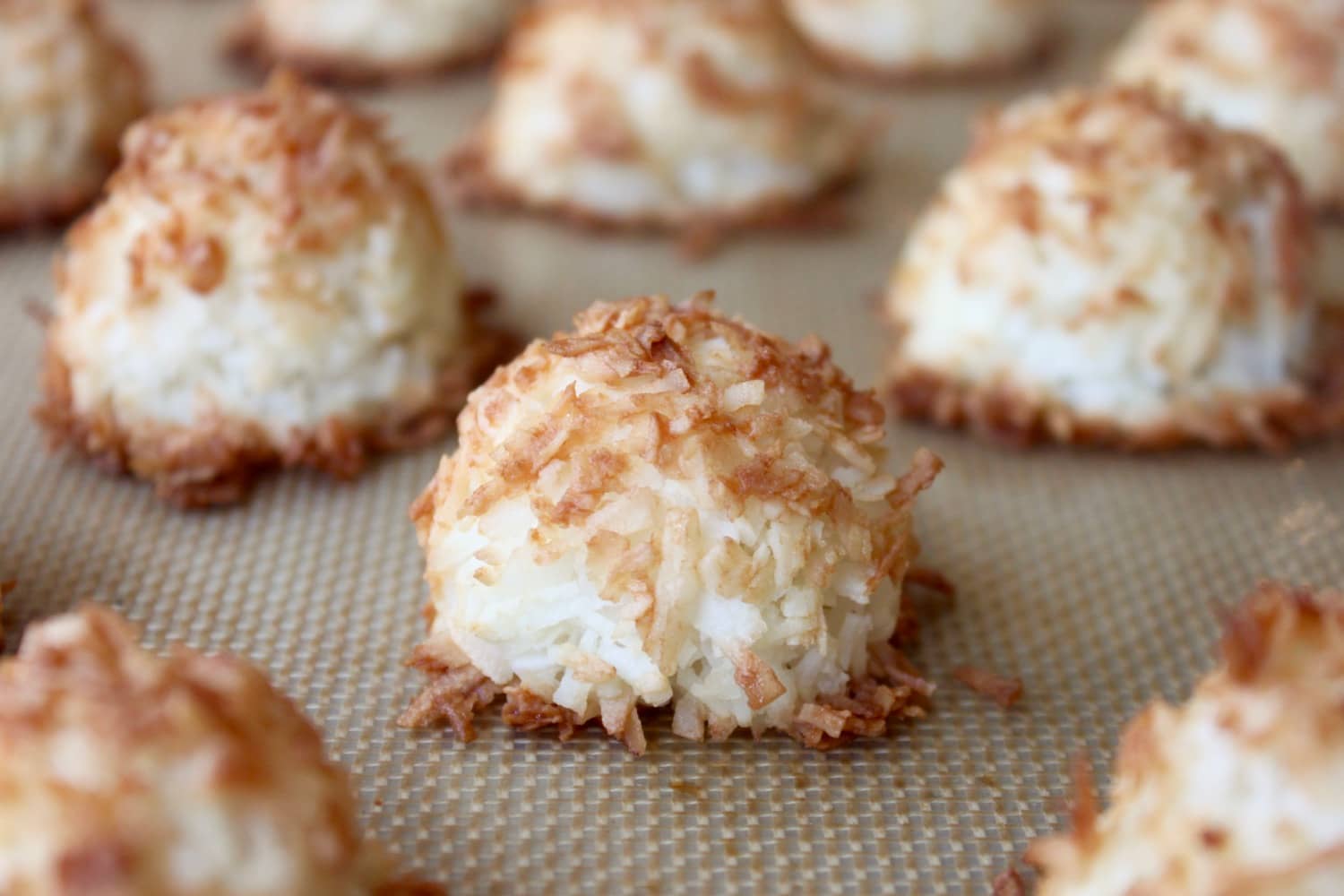 More than 100+ amazing recipes for the Jewish holiday of Passover, including a bunch of go-to, favorite Pesach recipes to make for Seder dinner, including appetizers, side dishes, and desserts, with plenty that work as great leftovers for the holiday week to follow. | glitterinc.com | @glitterinc // Paleo Coconut Macaroons