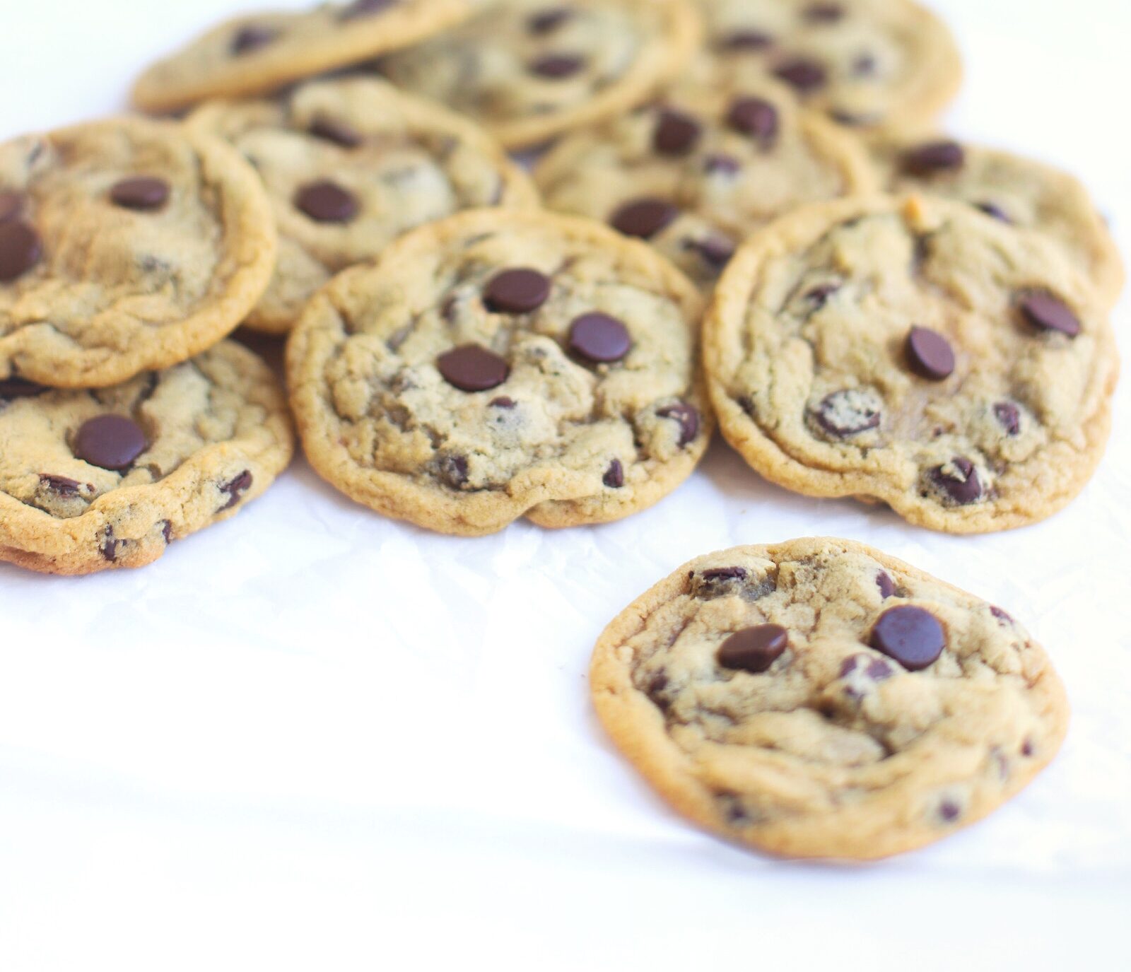 These are the very best dairy free chocolate chip cookies ever. Made in one bowl, the easy recipe results in ooey gooey, oh-so-soft and chewy perfect chocolate chip cookies every time. Plus, we have a few tricks for making these cookies vegan, and/or gluten-free too! | glitterinc.com | @glitterinc