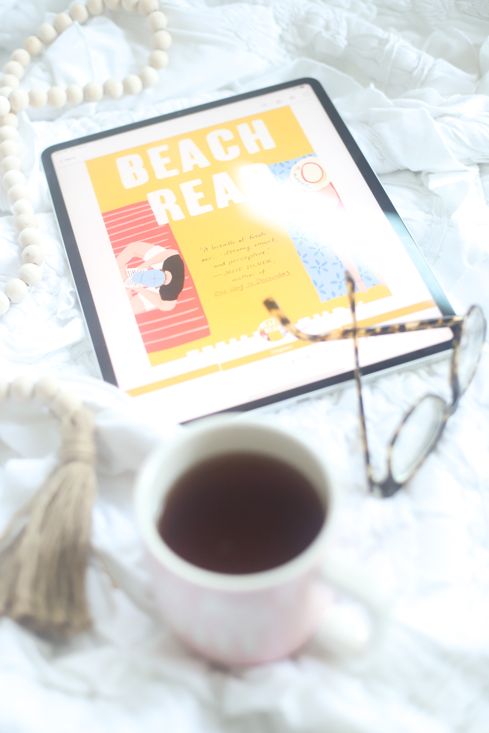 Get cozy and dive into a new romance novel with one of these 9 delightfully good romance books (that I recently read and loved!), all perfect to add to a cold weather reading list! | @glitterinclexi | GLITTERINC.COM