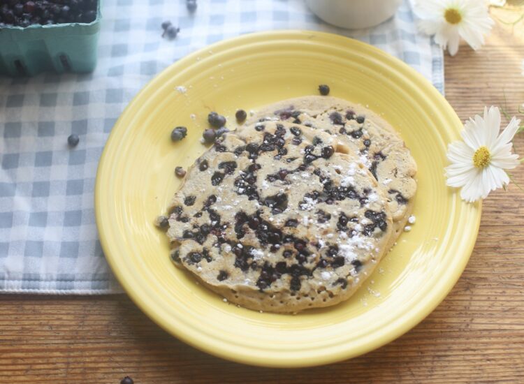 Light, fluffy, and easily our favorite pancake recipe, these birthday blueberry pancakes, bursting with fragrant Maine blueberries, are epically delicious. These pancakes are also incredible plain, with chocolate chips, or any other favorite mix-ins. (They‘re also the perfect celebratory pancakes!) | @glitterinclexi | GLITTERINC.COM