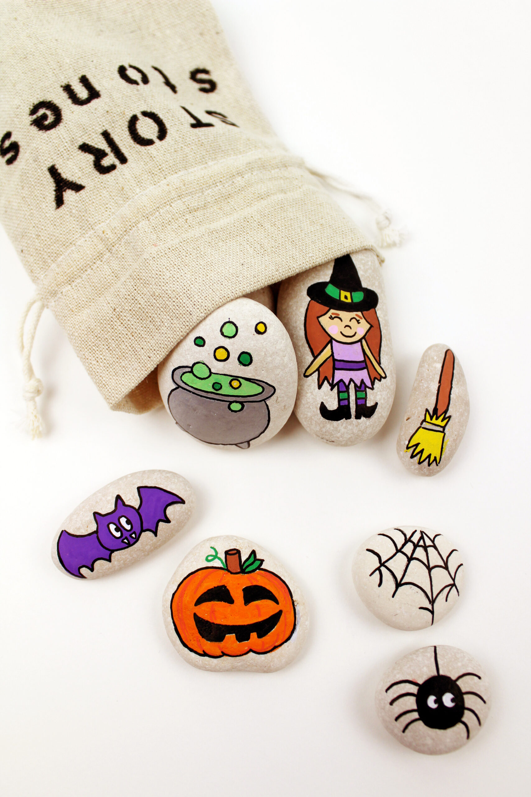 Get crafty this October and create something special with one of these 7 easy Halloween crafts and hands-on activities for toddlers and young kids! | @glitterinclexi | GLITTERINC.COM // Make Your Own Halloween Story Stones