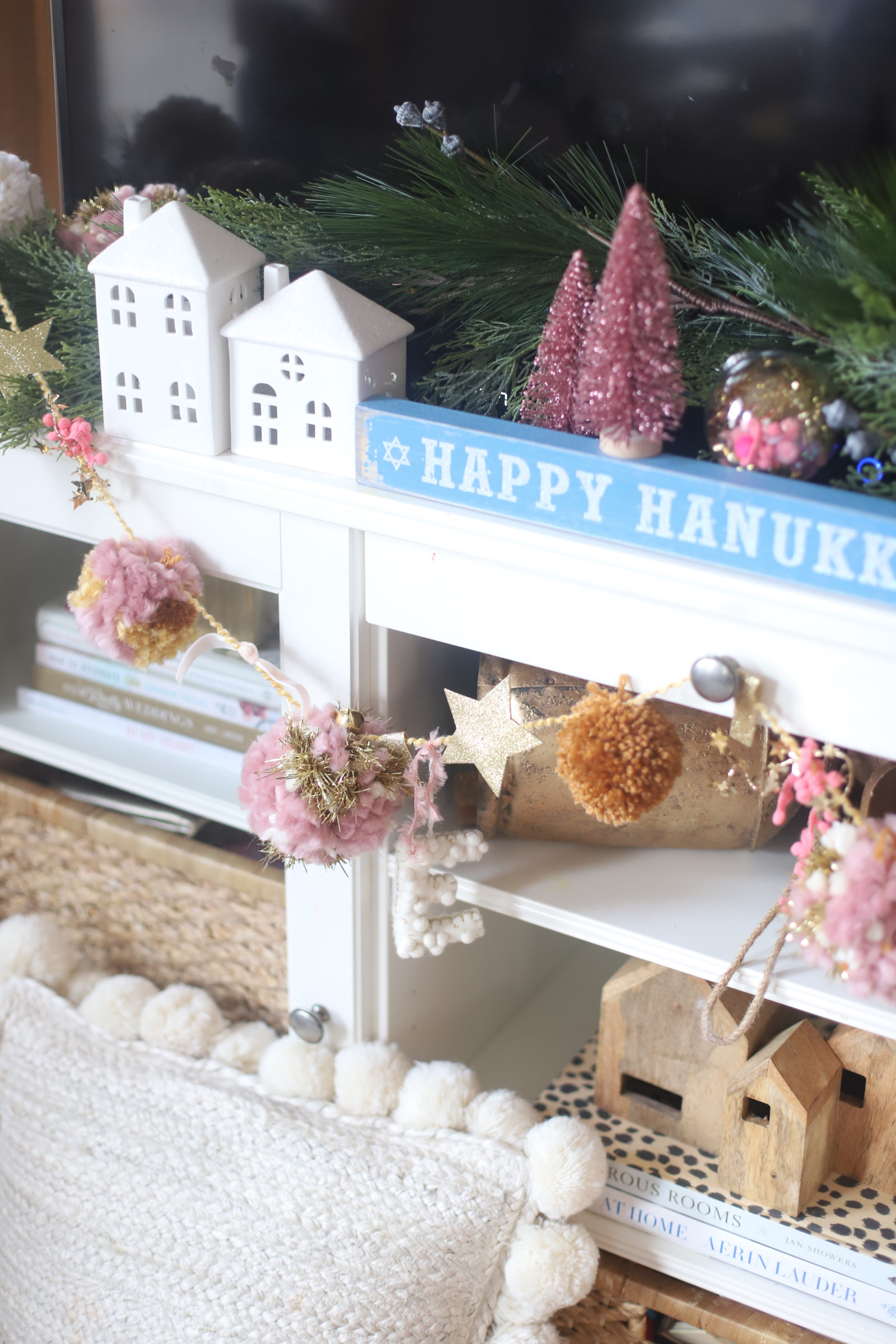 Make your own boutique-worthy DIY festive tinsel, ribbon, and glitter stars pom pom garland; a.k.a., a glammed up pom pom garland with a whole lot of pizazz.| @glitterinclexi | GLITTERINC.COM