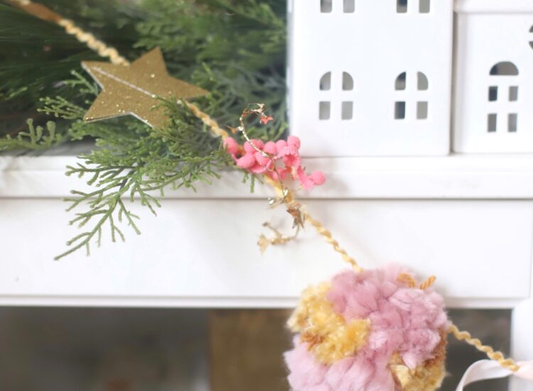 Make your own boutique-worthy DIY festive tinsel, ribbon, and glitter stars pom pom garland; a.k.a., a glammed up pom pom garland with a whole lot of pizazz.| @glitterinclexi | GLITTERINC.COM