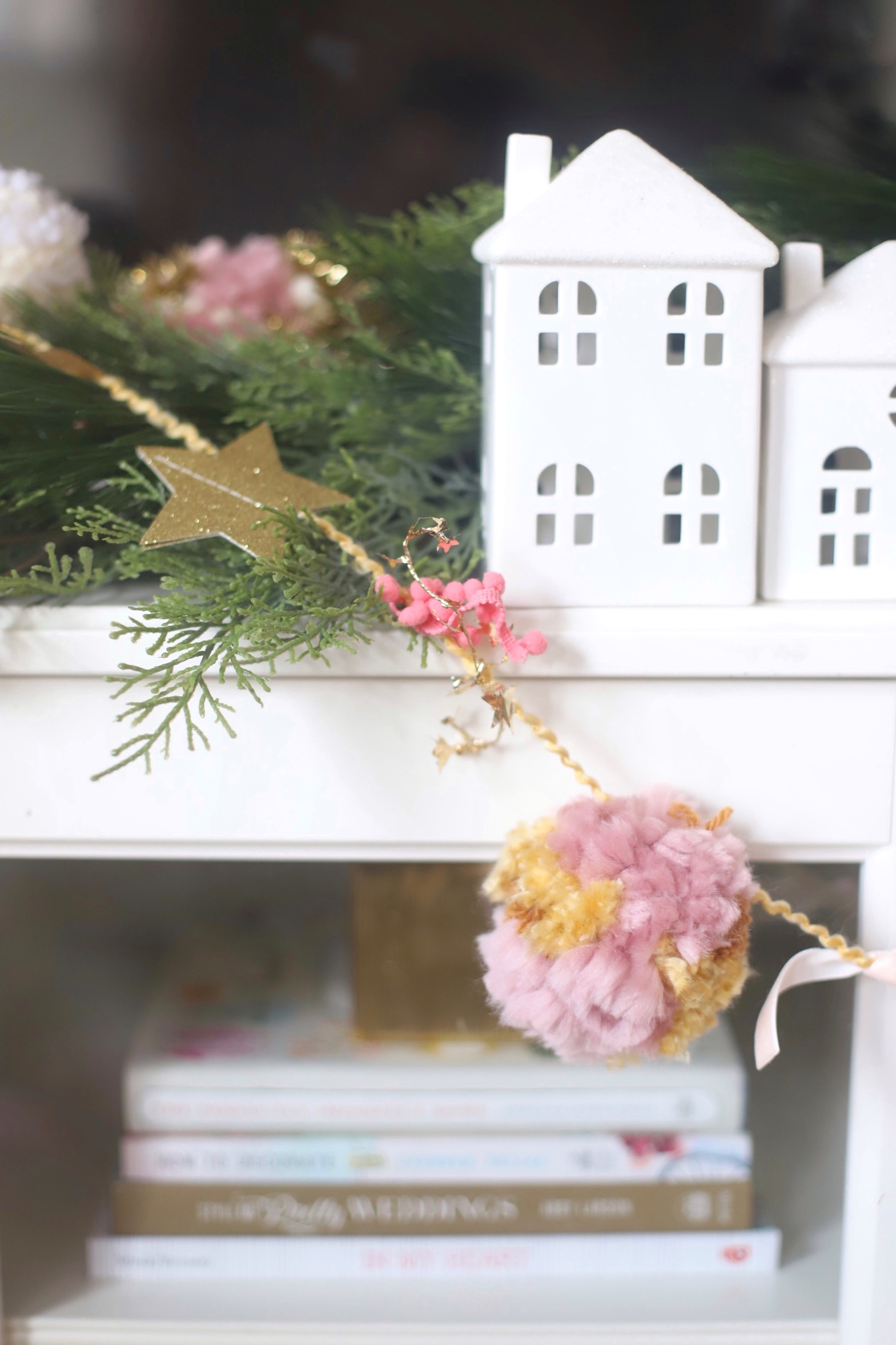 Make your own boutique-worthy DIY festive tinsel, ribbon, and glitter stars pom pom garland; a.k.a., a glammed up pom pom garland with a whole lot of pizazz.| @glitterinclexi | GLITTERINC.COM