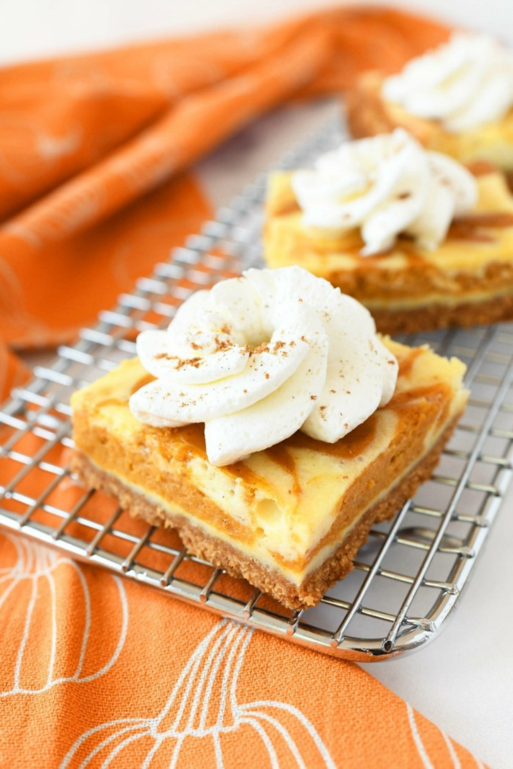 Easy Pumpkin Swirl Cheesecake Bars