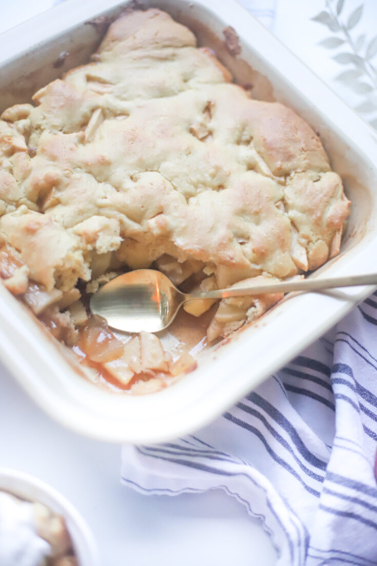 This deceptively delicious apple cobbler is rich, full of cinnamon, fragrant apples, and a velvety caramel sauce, topped with the most heavenly dough, and yet, is actually lower calorie than a traditional cobbler and can also be made dairy-free! GLITTERINC.COM