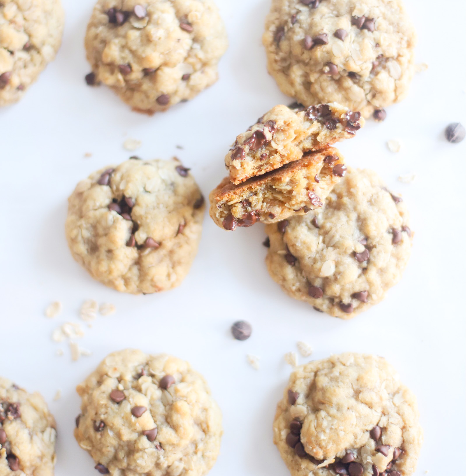 Hands down our very favorite oatmeal chocolate chip cookies, these heavenly oatmeal cookies are moist in the center, crisp and chewy on the outside, and totally delicious. They’re also super easy to make all in one bowl, and can easily be made dairy-free, vegan, or gluten-free! | @glitterinclexi | GLITTERINC.COM