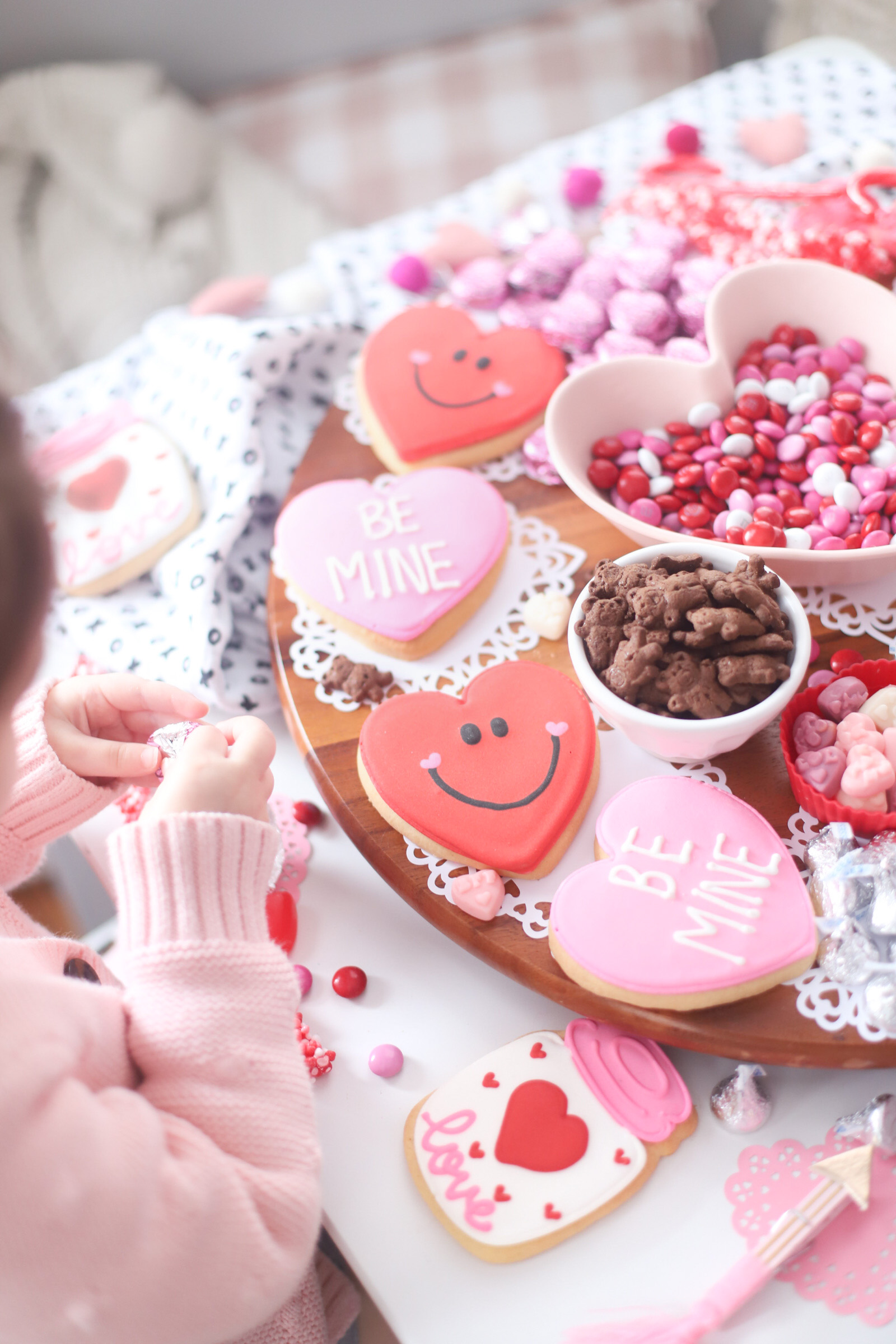 The Valentine’s Day dessert board is a spin on the traditional charcuterie, only this spread features nothing but dessert! Piled high with chocolates, candies, and cookies, this is the dessert spread of your sweet tooth dreams. No cooking required! | @glitterinclexi | GLITTERINC.COM