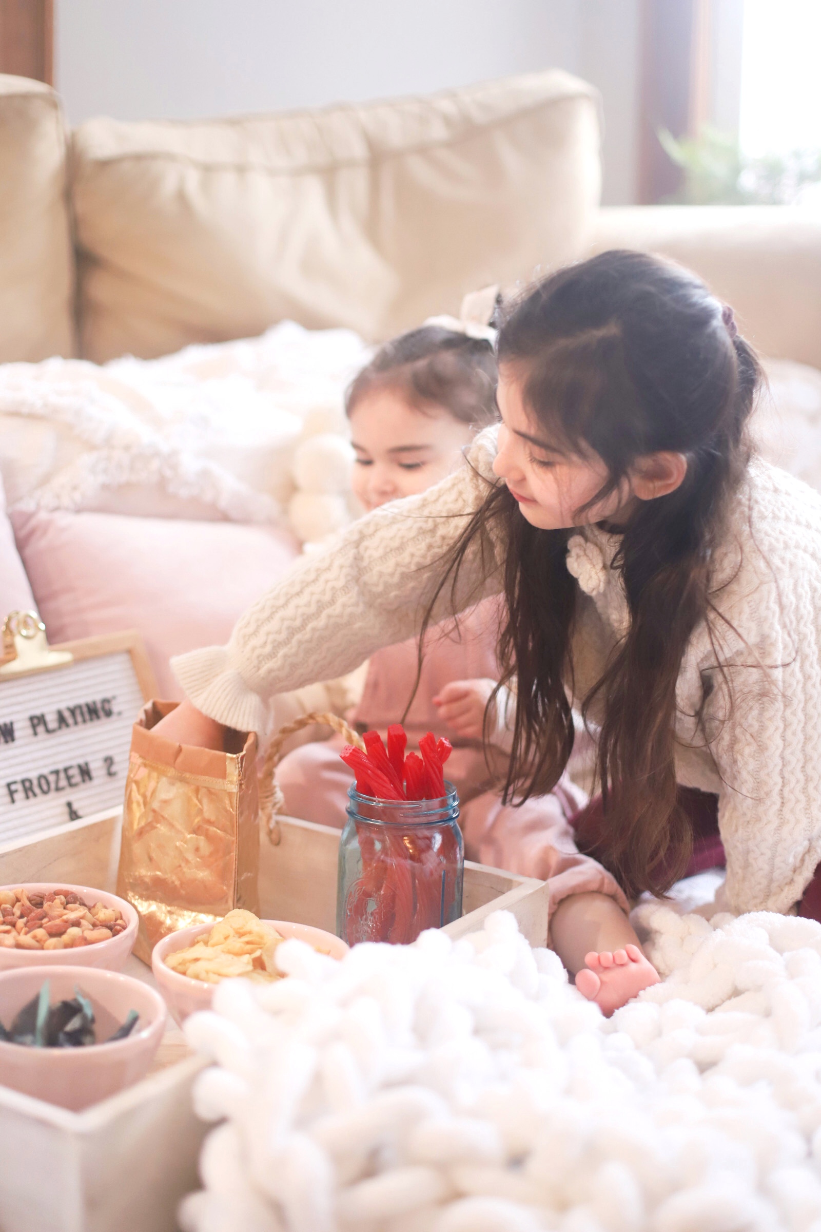 At-Home Family Movie Night Party | Building Our Own Cozy Indoor Living Room Theater | Movie Theater Snacks Concession Stand on the Coffee Table | Theatre Treat Board | @glitterinclexi | GLITTERINC.COM