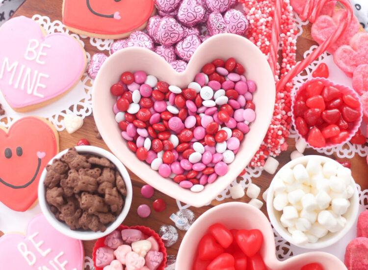 The Valentine’s Day dessert board is a spin on the traditional charcuterie, only this spread features nothing but dessert! Piled high with chocolates, candies, and cookies, this is the dessert spread of your sweet tooth dreams. No cooking required! | @glitterinclexi | GLITTERINC.COM