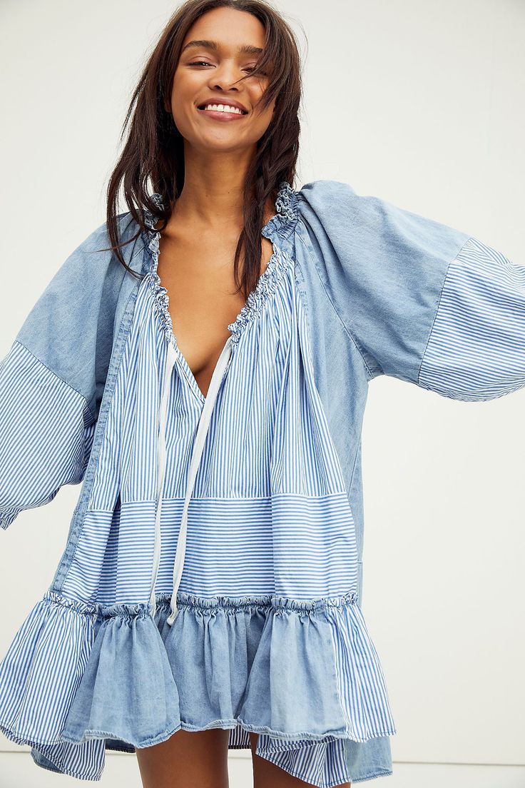 woman wearing Free People Keegan Tunic in blue