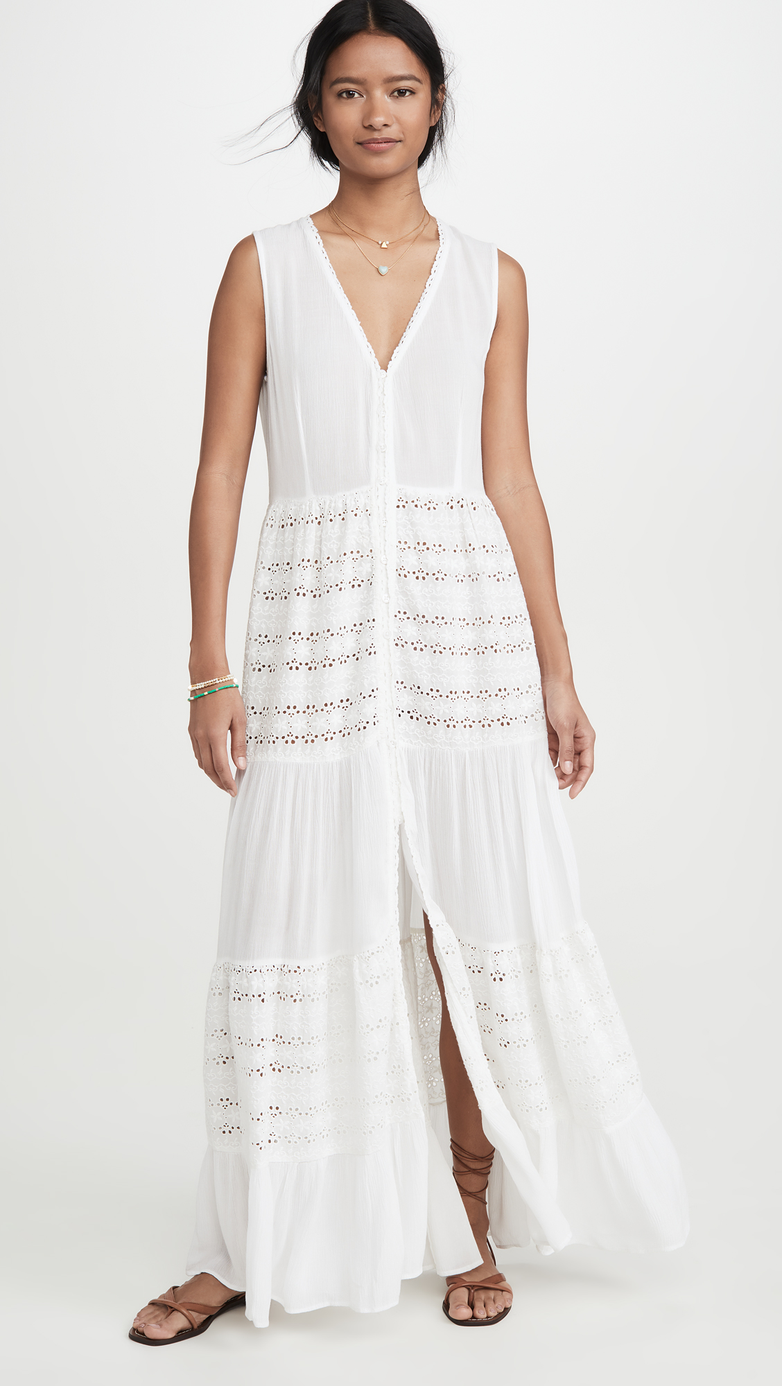 woman wearing Playa Lucila Eyelet white Maxi Dress and flat sandals