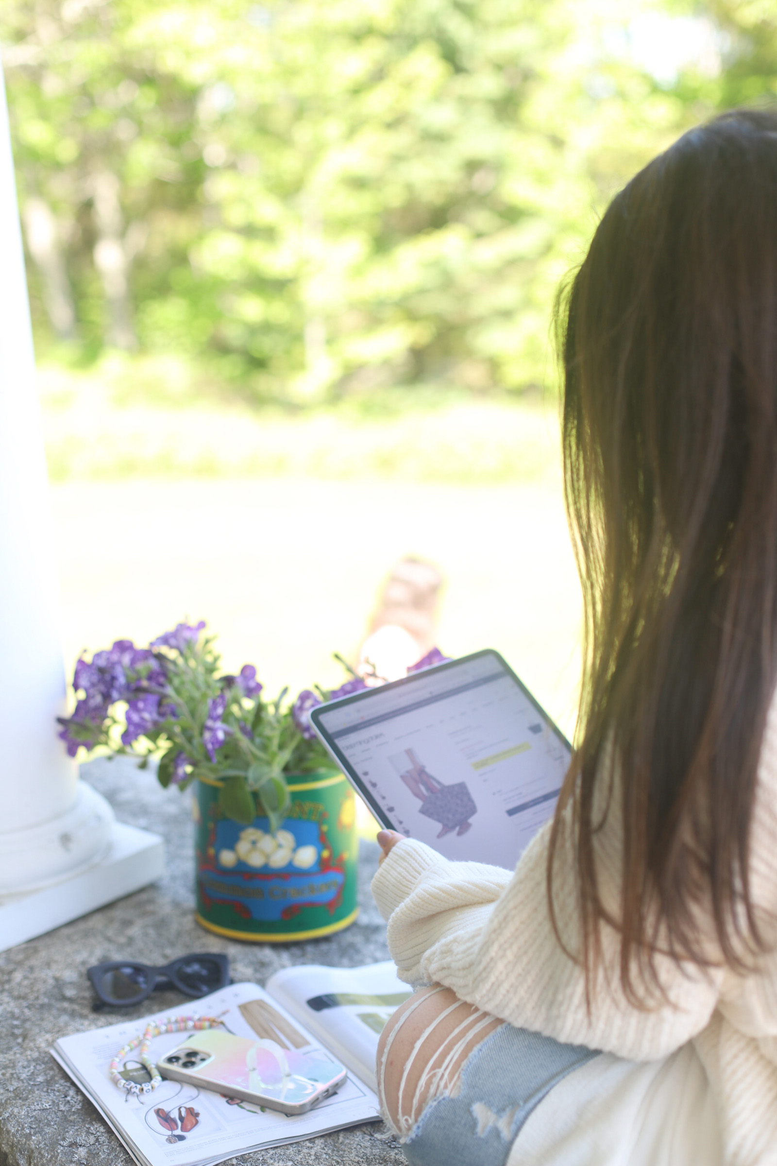 woman doing The Best Memorial Day Weekend Sales online shopping