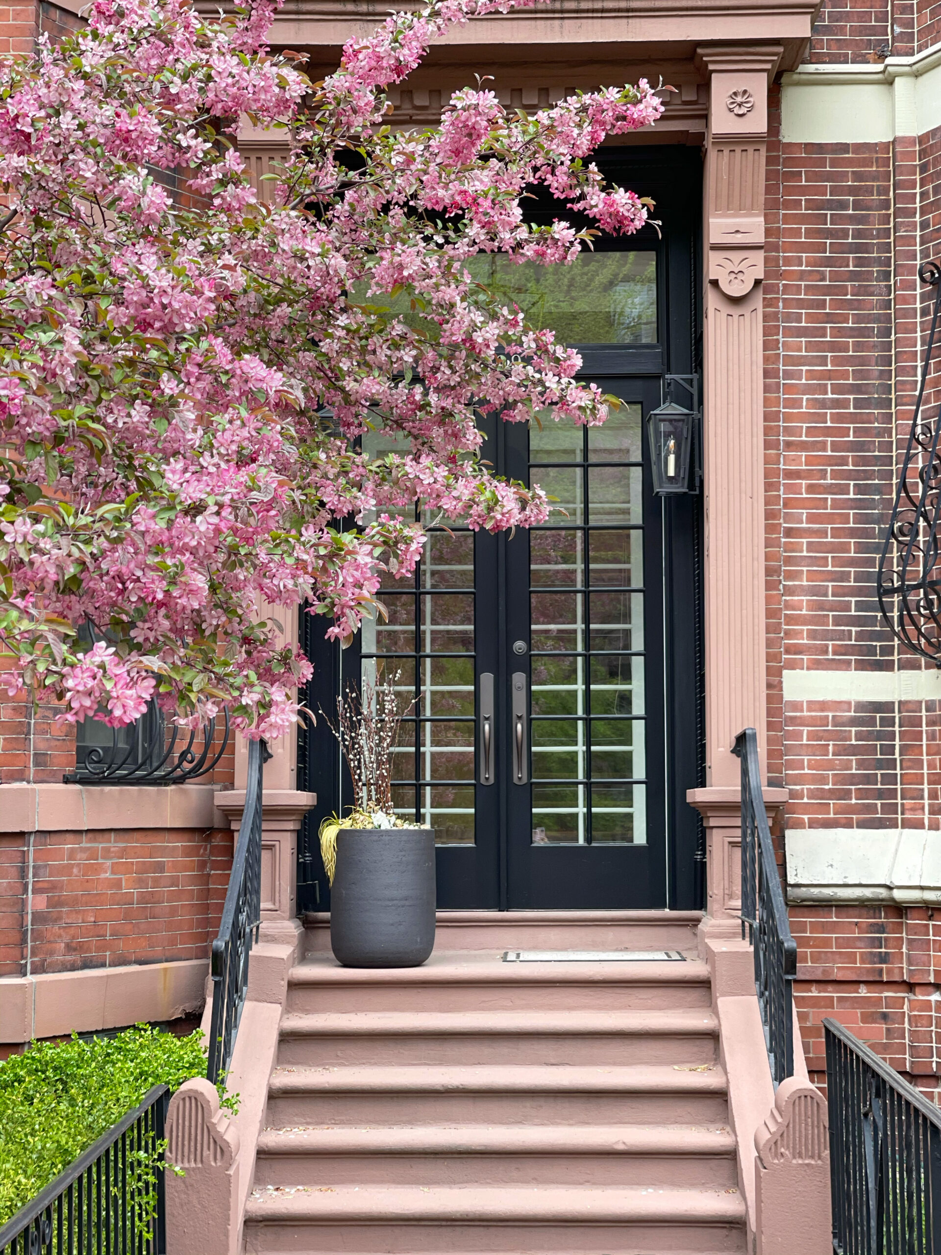 exterior of homes in Back Bay with stairs and plants for Mother's Day Weekend Plans