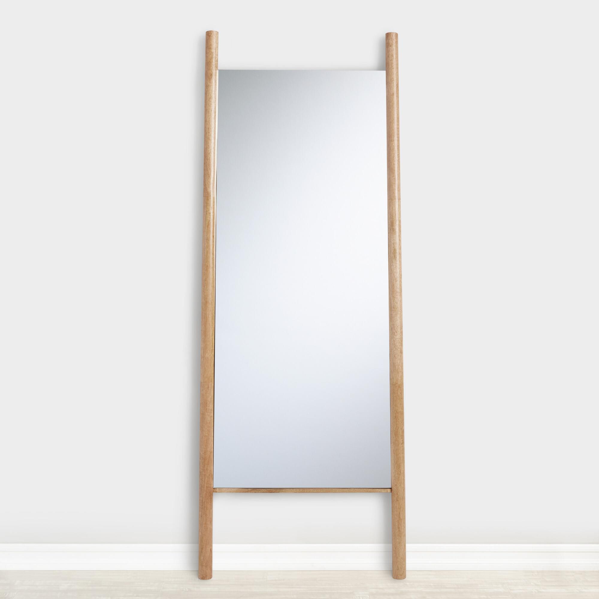 World Market Natural Wood Ladder Leaning Full Length Arya Mirror leaning on the wall 