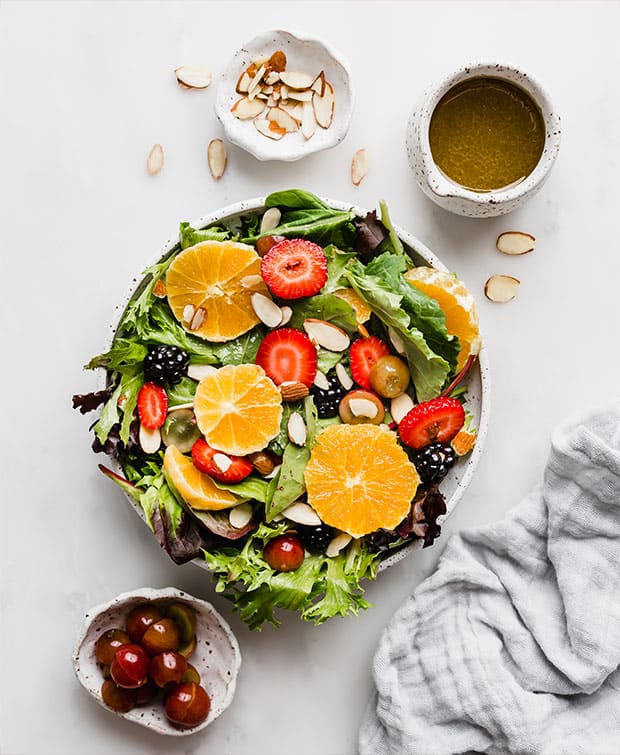 Citrus Summer Salad on a white plate 