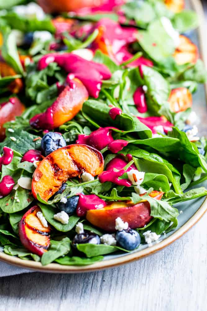 closeup of Grilled Peach Salad with Blueberry Vinaigrette