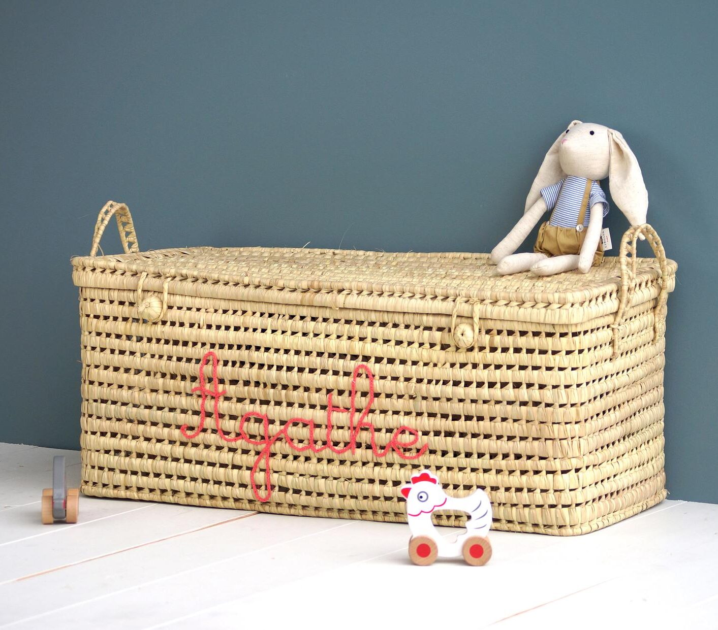 Personalized Palm Leaf Storage Toy Trunk - Rattan Basket with Lid, bunny stuffed toy, and wooden chicken toy for Summer Must-Haves