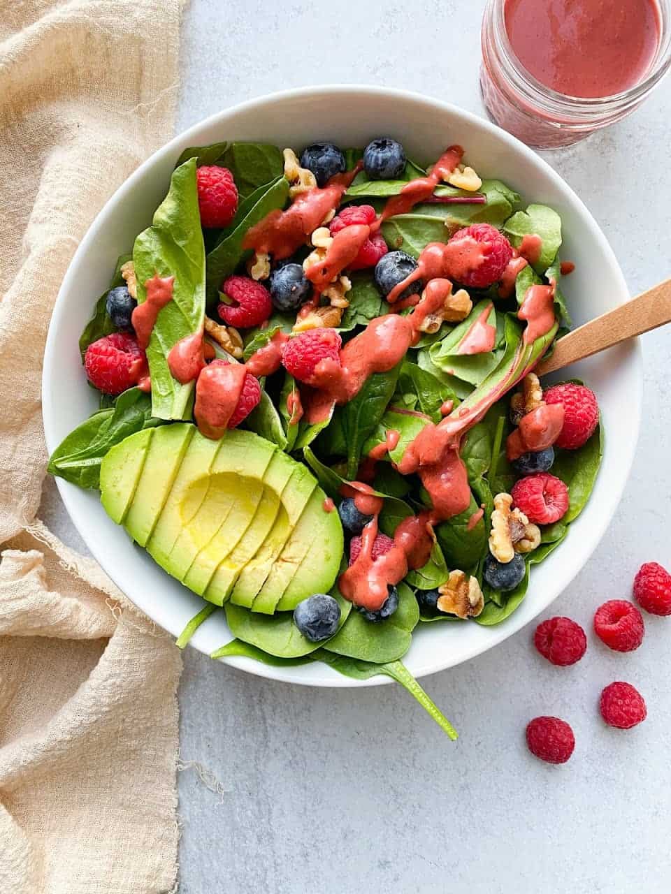 Berry Salad with Homemade Raspberry Vinaigrette on white serving bowl