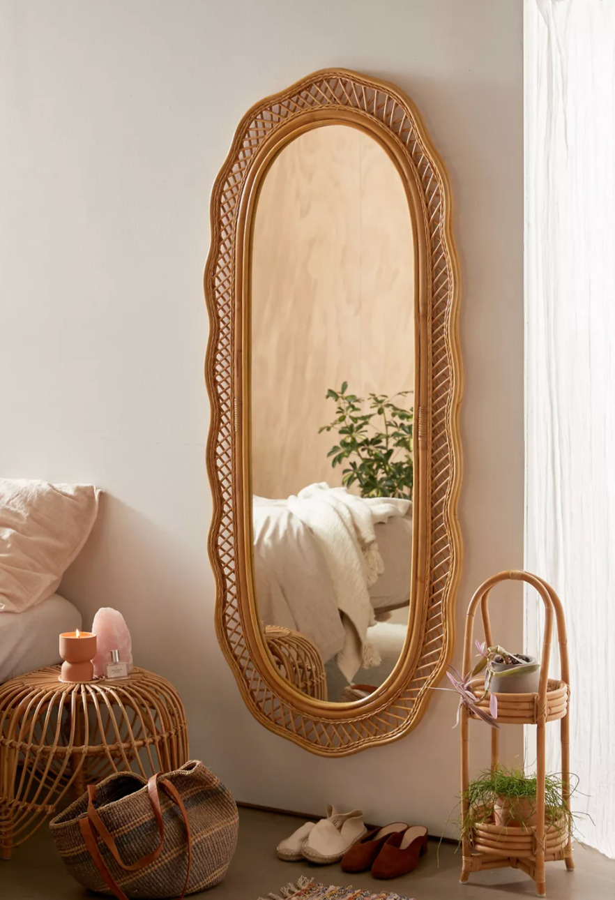 Urban Outfitters Malorie Wicker Wall Mirror , bag, shoes, in a bedroom for Summer Must-Haves