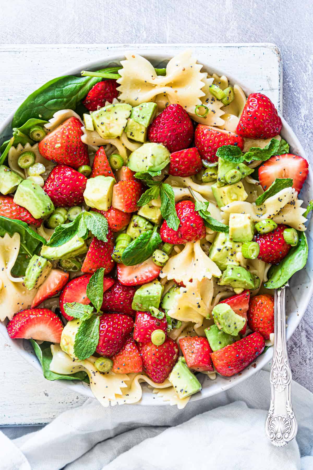 Strawberry Avocado Pasta Salad on a bowl for Summer Pasta Salad Recipes