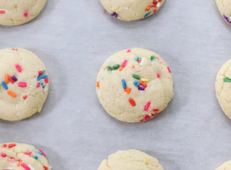 The softest sugar cookies with that perfect chewy center, packed with sprinkles; say hello to our very favorite dairy free sprinkle cookies! These pillowy soft cookies will quickly become your new favorite sugar cookie recipe! | @glitterinclexi | GLITTERINC.COM