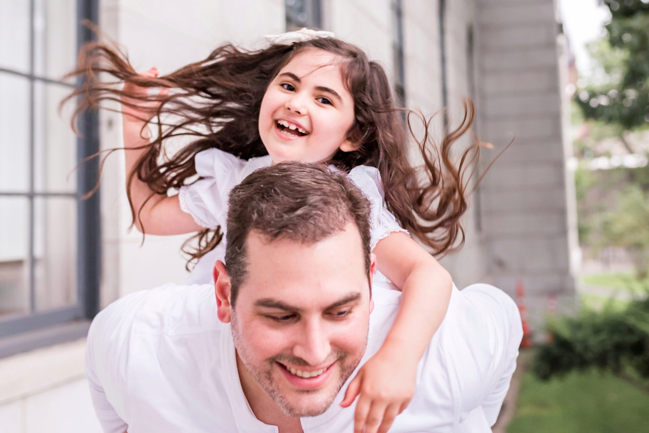 child with her father