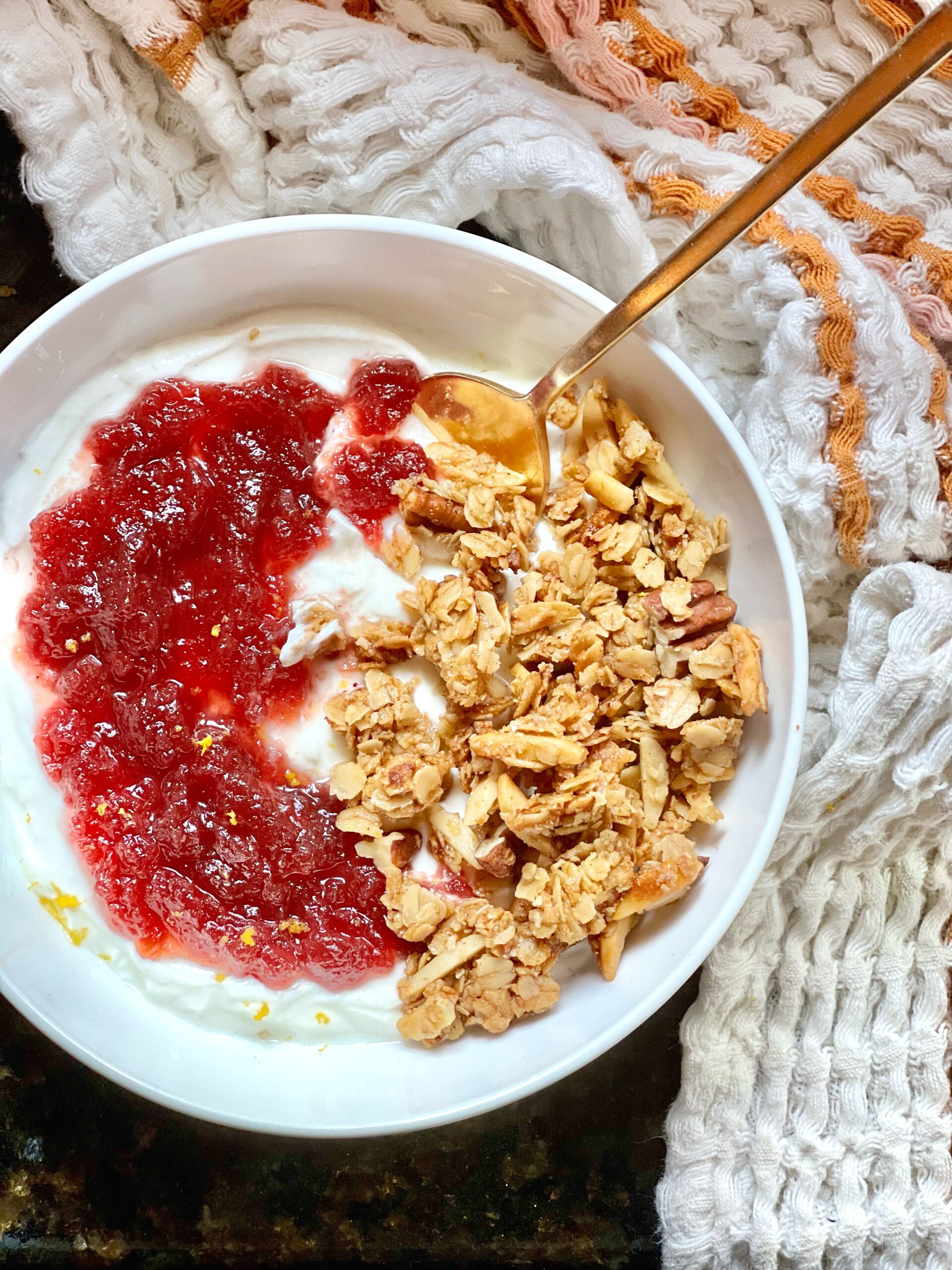 Cranberry Yogurt Parfaits in a white bowl 