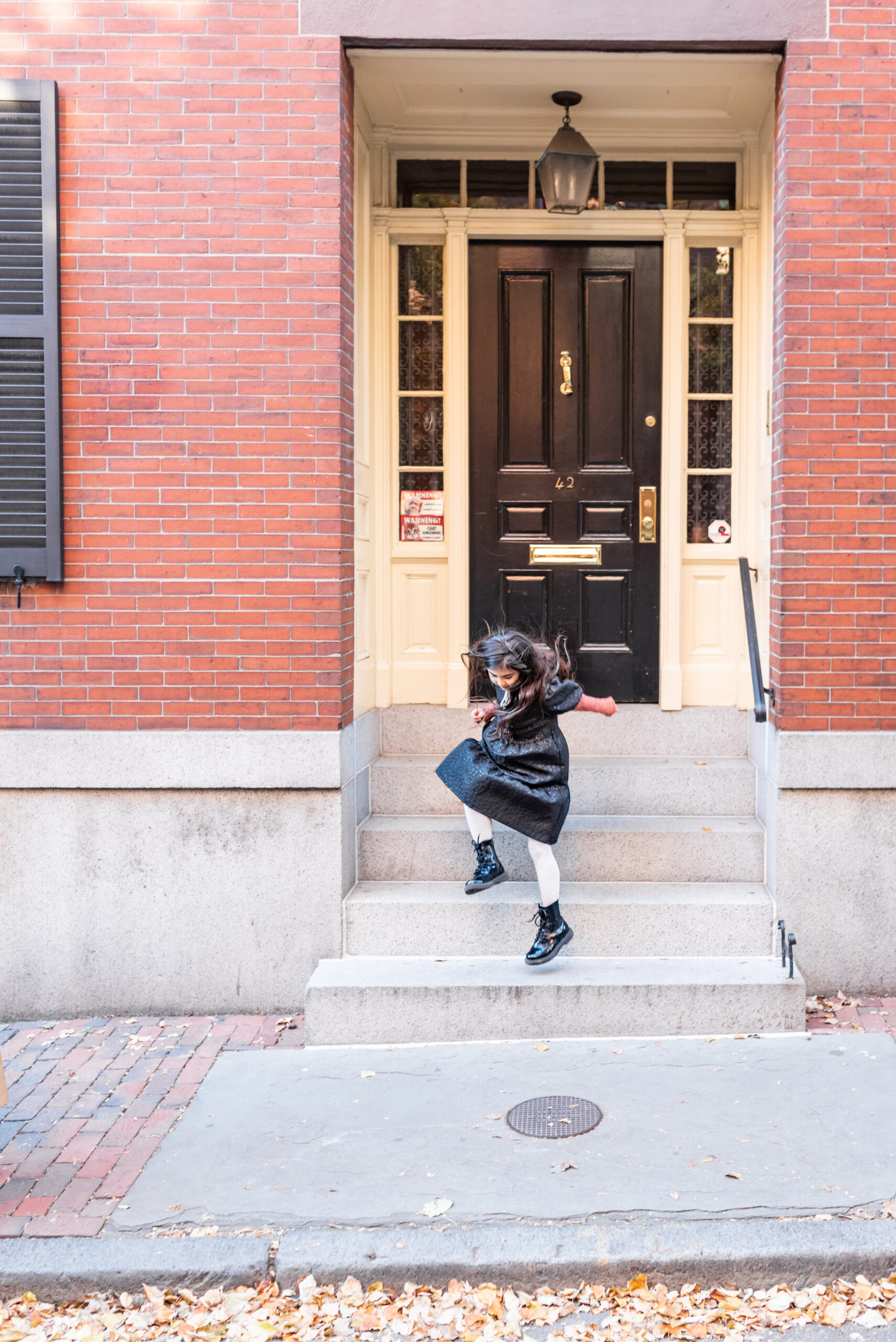 kid playing on the stairs 