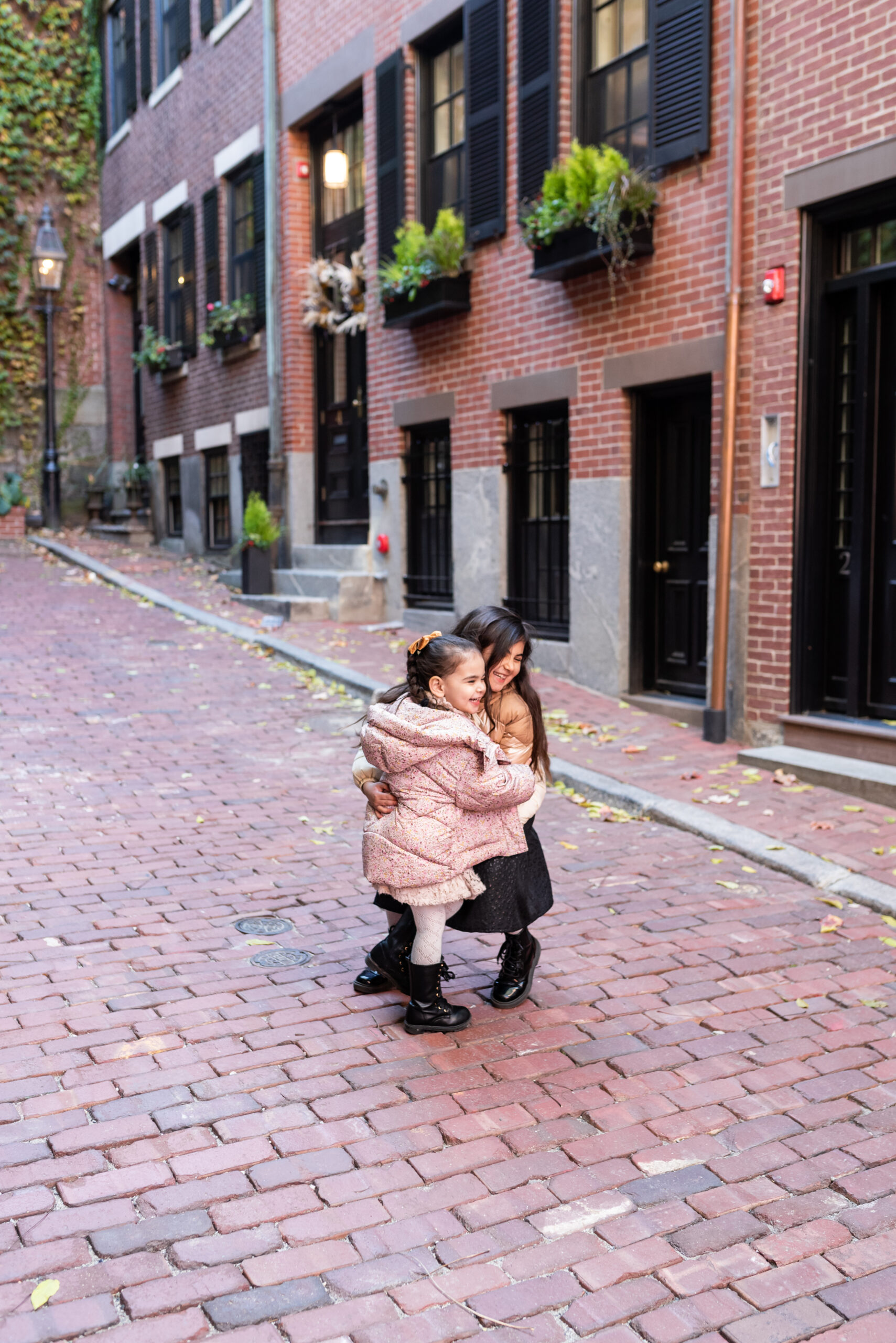 sisters for their Holiday Family Photos in Beacon Hill - Boston