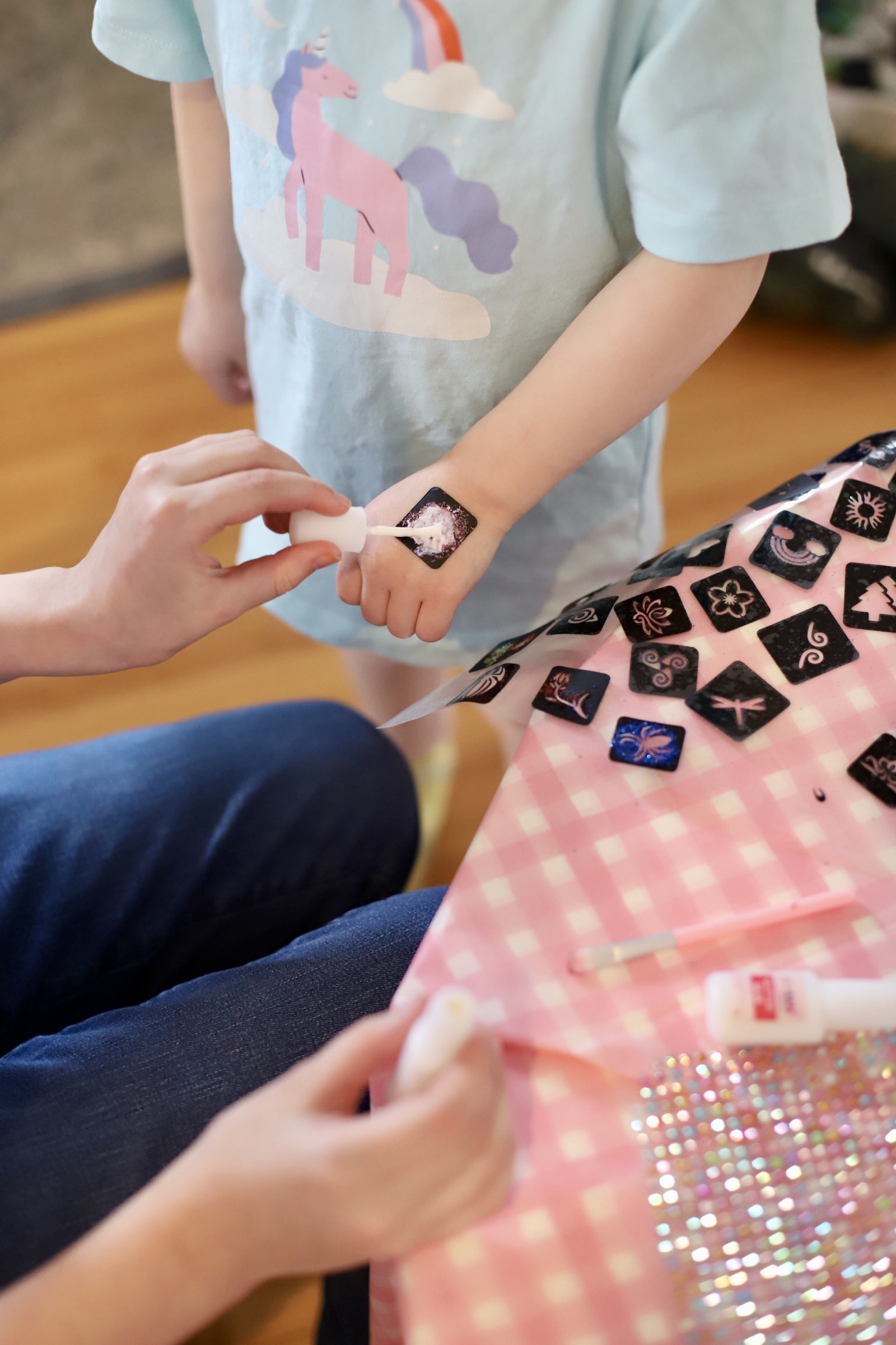 Bug-Themed 4th Birthday Party Ideas (So Cute & Easy!) - glitter tattoos for kids - glitterinc.com